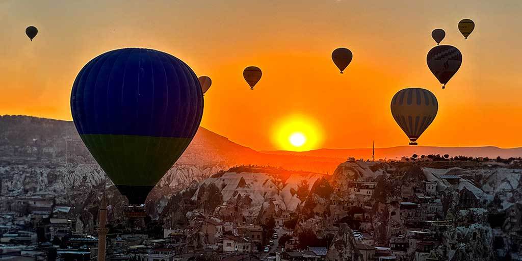 Balloons over Cappadocia valleys